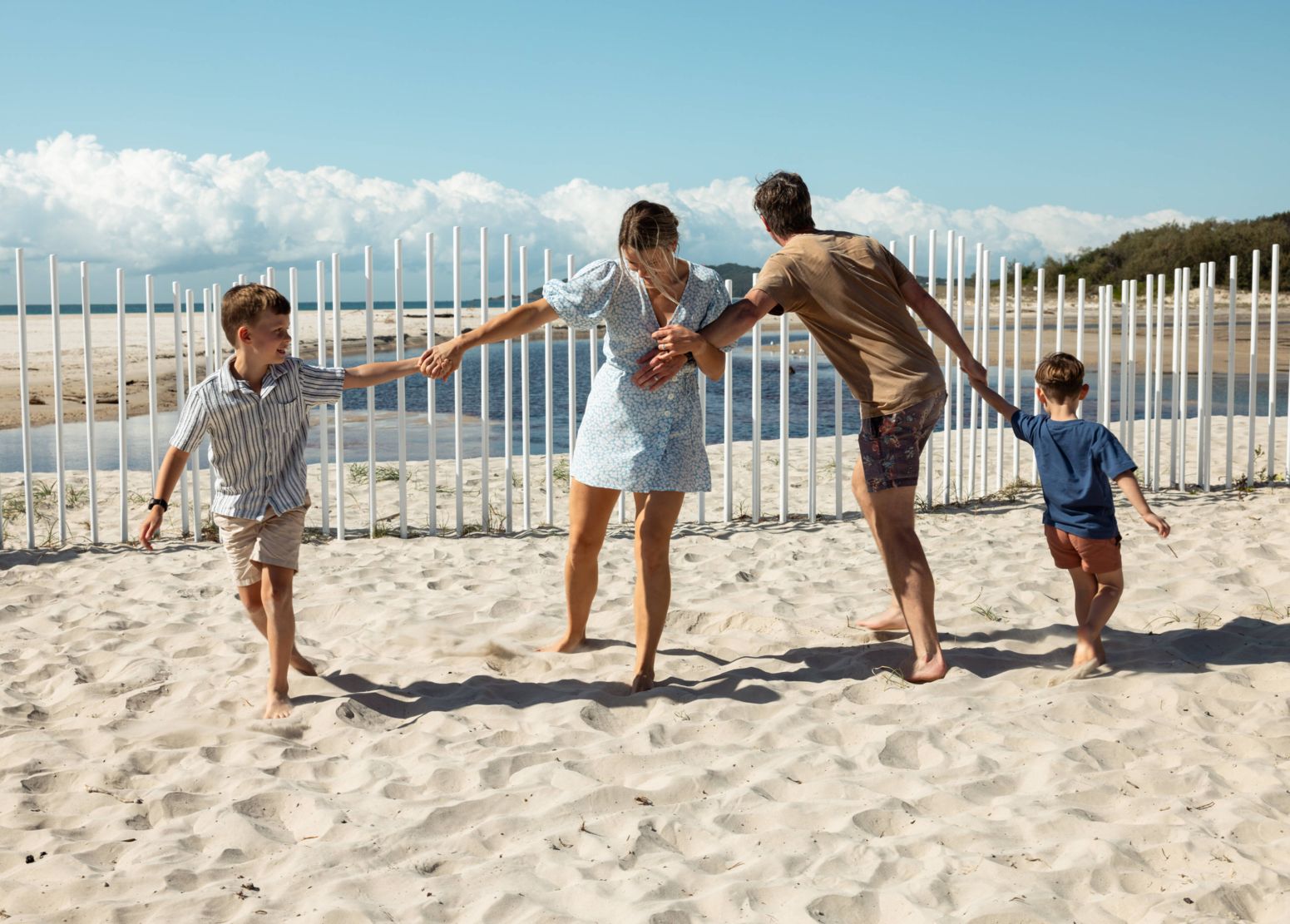Family at beachfront at Elements of Byron