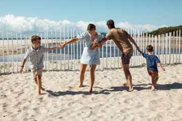 Family at beachfront at Elements of Byron