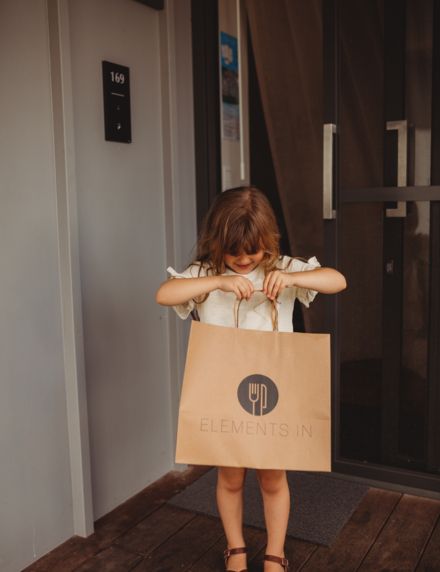 Little girl with In Room Dining at Elements of Byron