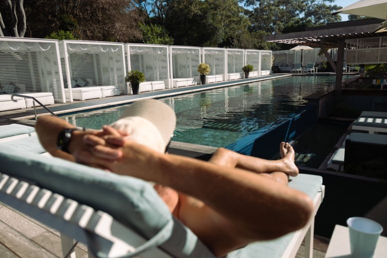 Man relaxing at Summer Salt Adults Only Pool