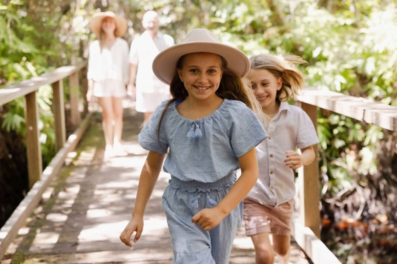 Family enjoying rainforest trails at Elements of Byron