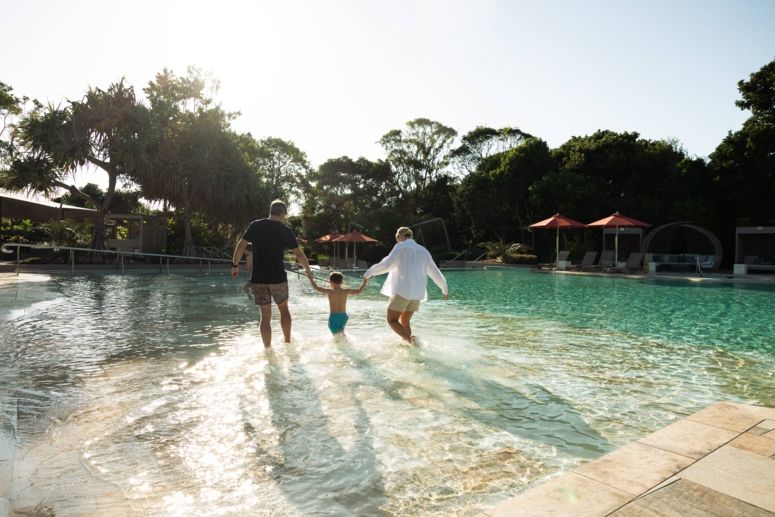 Family enjoying the pool at Elements of Byron